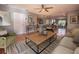 Bright living room featuring modern décor and an open floor plan to the kitchen and dining area at 2100 Forest Cir, Orlando, FL 32803