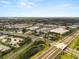 Aerial view highlights community proximity to shopping, dining, and major roadways for easy commuting at 218 Pebblerock Ct, Orlando, FL 32828