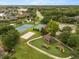 Aerial view of a community park, playground, and sport courts at 218 Pebblerock Ct, Orlando, FL 32828