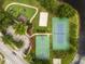 Aerial view of neighborhood park with basketball, tennis, and volleyball courts at 218 Pebblerock Ct, Orlando, FL 32828