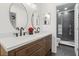 Bathroom with a modern vanity and a large tile shower at 218 Pebblerock Ct, Orlando, FL 32828