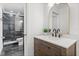 Bathroom with modern vanity and a large glass shower at 218 Pebblerock Ct, Orlando, FL 32828
