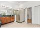 Main bathroom with a walk-in shower, walk-in closet and dual sinks at 218 Pebblerock Ct, Orlando, FL 32828