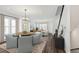 Bright living room showcasing dining area, hardwood floors, and modern furnishings at 2233 Valentine Aly, Orlando, FL 32804