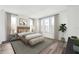 Comfortable main bedroom with natural light, neutral tones, and hardwood floors at 2233 Valentine Aly, Orlando, FL 32804