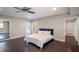 Large main bedroom featuring access to the pool area, walk-in closet and en-suite bathroom at 2325 E Harding Street, Orlando, FL 32806