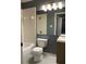 Bathroom featuring a shower-tub combination, mirror, and tile flooring at 2826 Osprey Cove Pl # 103, Kissimmee, FL 34746