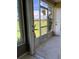 Enjoy the outdoor views from this screened patio, perfect for relaxing at 2826 Osprey Cove Pl # 103, Kissimmee, FL 34746