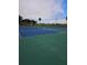 Community tennis court for recreational activities at 2826 Osprey Cove Pl # 103, Kissimmee, FL 34746