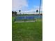 Tennis court with benches for relaxing and enjoying the scenery at 2826 Osprey Cove Pl # 103, Kissimmee, FL 34746