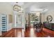 Welcoming foyer and dining area with hardwood floors at 3618 Rothbury Dr, Belle Isle, FL 32812