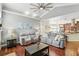 Comfortable living room with hardwood floors and neutral color scheme at 3618 Rothbury Dr, Belle Isle, FL 32812