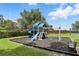 Community playground featuring slides, swings and play structure at 3618 Rothbury Dr, Belle Isle, FL 32812