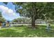 Community playground featuring a slide, swings and tennis court at 3618 Rothbury Dr, Belle Isle, FL 32812