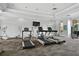 Community fitness center featuring modern treadmills, elliptical machines, and weights at 436 Caraway Dr, Kissimmee, FL 34759