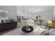 Bright, open-concept living space featuring a modern kitchen and stylish decor at 436 Caraway Dr, Kissimmee, FL 34759