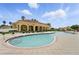 A view of the community clubhouse and swimming pool with ample lounge seating at 436 Caraway Dr, Kissimmee, FL 34759