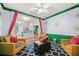 Open living area showcasing creative design elements, a ceiling fan, and bright colors at 5012 Shoreway Loop # 10107, Orlando, FL 32819