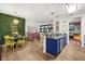 Modern dining and living area with stylish decor and an open layout at 5012 Shoreway Loop # 10107, Orlando, FL 32819
