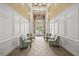 Elegant lobby with high ceilings, stylish seating, and ample natural light creating a welcoming atmosphere for residents at 5012 Shoreway Loop # 10107, Orlando, FL 32819