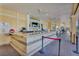 Spacious outdoor bar area with a long counter, TV, and seating at 5012 Shoreway Loop # 10107, Orlando, FL 32819
