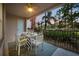 Outdoor patio with dining set, providing a great space for relaxation and entertaining at 5012 Shoreway Loop # 10107, Orlando, FL 32819