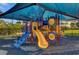 Colorful and shaded playground with slides and climbing structures at 5012 Shoreway Loop # 10107, Orlando, FL 32819
