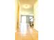 Bright foyer with tile flooring, staircase, and views of the living area at 5107 Longmeadow Park St, Orlando, FL 32811