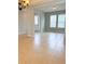 Open-concept living room with tile flooring and natural light at 5107 Longmeadow Park St, Orlando, FL 32811