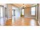 Open-concept living room with tile flooring and natural light at 5107 Longmeadow Park St, Orlando, FL 32811
