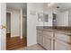 Bright bathroom with granite counters, stylish fixtures, and modern cabinets at 5200 Sunset Canyon Dr, Kissimmee, FL 34758