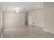 Large living room featuring a chandelier, tile floors, and neutral-colored walls at 5200 Sunset Canyon Dr, Kissimmee, FL 34758
