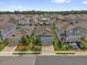 A street view showing neighborhood homes with well-kept lawns and landscaping, showcasing a vibrant community at 555 Jett Ln, Davenport, FL 33837