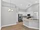 Bright kitchen features granite countertops, stainless steel appliances, and ample cabinet space at 632 Bridge Creek Blvd, Ocoee, FL 34761