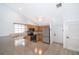 Well-lit kitchen featuring wooden cabinets, stainless steel appliances, and a breakfast bar for casual dining at 6512 Grosvenor Ln, Orlando, FL 32835