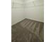 Walk-in closet with carpeted flooring and shelving at 680 Sand Pine Ln, Haines City, FL 33844