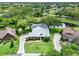 Aerial view of a single-story house near a pond and golf course at 6836 Bittersweet Ln, Orlando, FL 32819