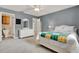 Airy bedroom with ensuite bathroom and white furnishings at 6836 Bittersweet Ln, Orlando, FL 32819