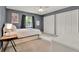 Bedroom with large closets, neutral carpet and a gray painted walls at 6836 Bittersweet Ln, Orlando, FL 32819