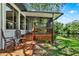 Wooden deck with view of pond and green space; ceiling fan in screened porch at 6836 Bittersweet Ln, Orlando, FL 32819