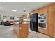 Open kitchen with modern appliances and an island, perfect for entertaining and culinary pursuits at 6836 Bittersweet Ln, Orlando, FL 32819
