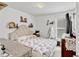 Comfortable bedroom with bright walls, elephant themed bedding, and natural light at 8152 Fan Palm Way, Kissimmee, FL 34747
