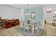 This dining room is the perfect setting for meals with friends and Gathering at 8152 Fan Palm Way, Kissimmee, FL 34747