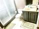 Bathroom featuring a toilet, sink and tiled floors at 8206 Gemstone Ct, Orlando, FL 32836