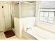 Bright bathroom with large bathtub, shower, and window at 8206 Gemstone Ct, Orlando, FL 32836