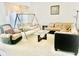 Living Room with couches and swing-style seating at 8206 Gemstone Ct, Orlando, FL 32836