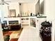 Bright living room features a fireplace, custom built-ins, and ample natural light at 8206 Gemstone Ct, Orlando, FL 32836