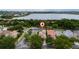 Breathtaking aerial view of the property, showcasing its prime location near the lake at 8108 Via Bella Notte, Orlando, FL 32836
