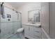 Bathroom with a glass shower and white vanity at 8108 Via Bella Notte, Orlando, FL 32836