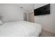 Bedroom showcasing a double bed and wall mounted TV at 8108 Via Bella Notte, Orlando, FL 32836